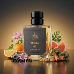 Perfume bottle labeled 'Silo Scents Terra 47' with natural elements on a warm background